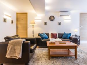 Maisons de vacances Maison de ville a St Nazaire, pres du front de mer, climatisee, 3 chambres avec sdb privatives, WiFi - FR-1-306-1203 : photos des chambres