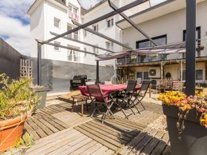Maisons de vacances Maison de ville a St Nazaire, pres du front de mer, climatisee, 3 chambres avec sdb privatives, WiFi - FR-1-306-1203 : photos des chambres
