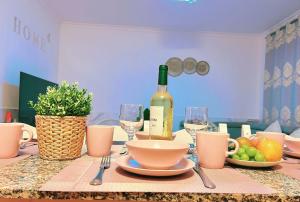 Big Villa Puerto Rico streetfront with private saltwater jacuzzi pool, BBQ, kitchen & 3 terraces near shopping center