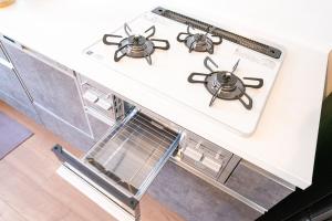 麦吉 新築の清潔なお部屋 無料駐車場 関西空港 心斎橋道頓堀エリアへも直通