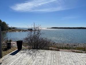 Cottage with own beach, seaterrace & pavillion.