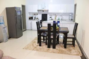 luxurious fully furnished three bedroom apartment with swimming pool ,fully equipped gym children play area, ample parking space and a relaxing rooftop with a breathtaking city views