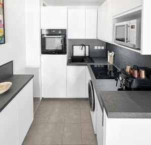 Appartements Paloma - Appartement Stella-plage en centre-ville : photos des chambres