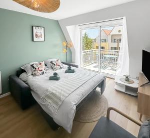 Appartements Paloma - Appartement Stella-plage en centre-ville : photos des chambres