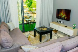 newly furnished two bedroom apartment with swimming pool, fully equipped gym, private parking space, children playground and unbeatable scenic city views in lavington