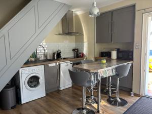 Appartements Maisonnette au pied du marche et 300 m de la plage : photos des chambres