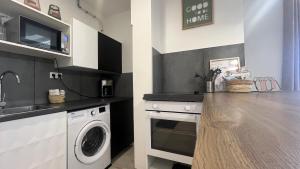 Appartements La Cite Guillemaud 1930, parking, balcon et wifi : photos des chambres