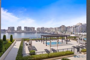 Boho Bayfront 1BR in La Sirene 2 Seaport View