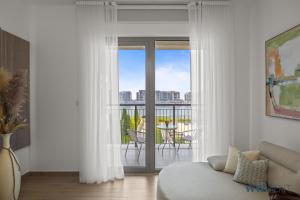 Boho Bayfront 1BR in La Sirene 2 Seaport View