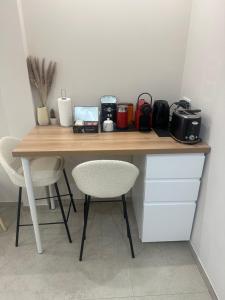 Appartements Charmant Studio avec terrasse : photos des chambres