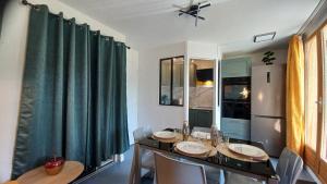 Appartements Les Epicuriens : photos des chambres