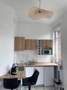 Appartements Studio equipe a Valenciennes centre : photos des chambres