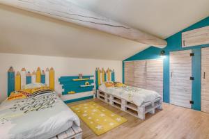 Maisons de vacances Le JARDIN DES DELIS gite NEUF avec piscine bio UV : photos des chambres