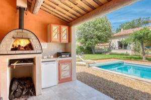 Maisons de vacances Le JARDIN DES DELIS gite NEUF avec piscine bio UV : photos des chambres