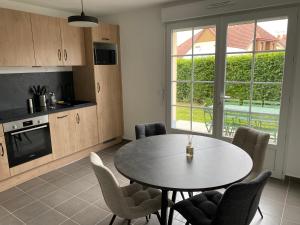 Maison 2-6 pers avec terrasse,jardin , parking privé