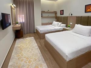 شقة فاخرة 3 غرف نوم و حديقة خاصة في الشيخ زايد - Zayed Suites A