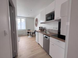 Appartements Logements centre Bourg : photos des chambres