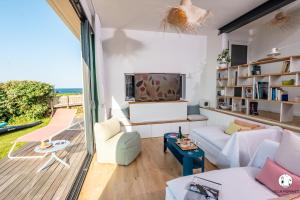 Villas Villa Ponant 5 etoiles a Doelan, piscine face mer : photos des chambres