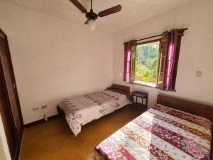 Casa Itamambuca natureza surf - churrasqueira garagem