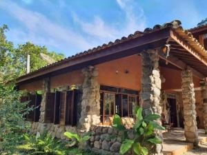 Casa Itamambuca natureza surf - churrasqueira garagem