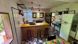 Casa Itamambuca natureza surf - churrasqueira garagem