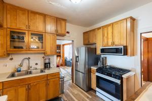 Cozy Getaway with Hot Tub, Patio & Fenced Yard home