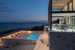Villa Serena Luxury Seafront Escape with Pool