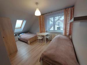 Ważka - pokoje do wynajęcia