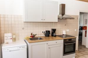 CosyHomes24 - Centrally with parking space and balcony - GE09b