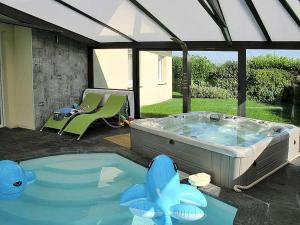 Appartements Bretagne,maison avec piscine et spa : photos des chambres