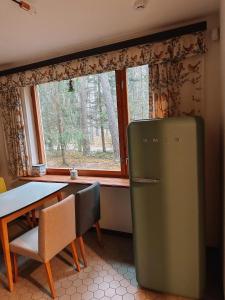 Charming house by the sea in Apšuciems