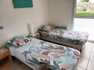 T3 vue mer, 2 chambres, piscine, terrasse, parking public gratuit à 150m