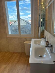 Appartements Appartement les Orchidees et les Marguerites : photos des chambres