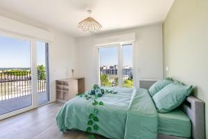 Appartements 2P moderne avec balcon et vue a Massy Palaiseau : photos des chambres