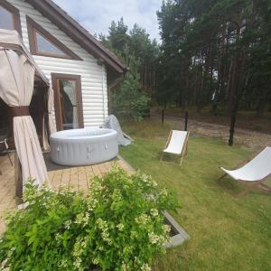 Domek pod sosnowym lasem