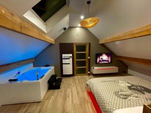 Appartements Sublime appartement SPA detente et Salle cinema 4K : photos des chambres
