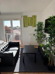 Appartements Home Nature et Design : photos des chambres