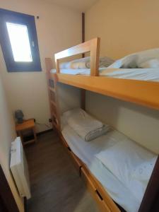 T2 familial 4-5 pers bord de la neste, parking privé gratuit