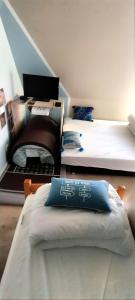 Maisons de vacances Coeur de granit rose, meuble alliant le charme de l-authentique breton et du confort, classe 3 etoiles, a 5mn de 13 plages de la reputee cote de granit rose : photos des chambres
