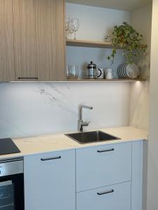 Apartamento R14 en Miño con 2 dormitorios, salón-cocina, 1 baño y zona de lavandería, situado cerca de las playas