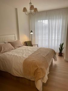 Apartamento R14 en Miño con 2 habitaciones, salón-cocina, 1 baño y zona de lavandería, situado cerca de las playas