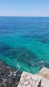 Emerald Dreamscape with Private Beach & Pool