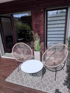Appartements Joli studio avec terrasse : photos des chambres