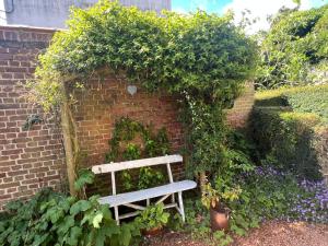 Appartements Appartement Cosy avec jardinet : photos des chambres