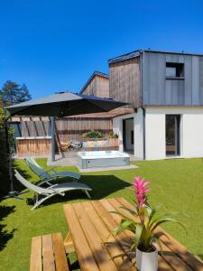 Villas La VILLA OCEAN AVEC SPA et PISCINE - Les GITES DE CAMPARAN : photos des chambres