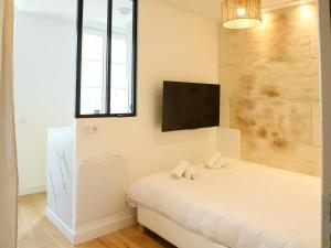 Appartements Le Petit Jacques Cognac Studio : photos des chambres