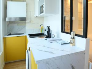 Appartements Le Petit Jacques Cognac Studio : photos des chambres
