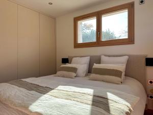 Appartements Appartement a 100metres du lac avec terrasse privee - Vue panoramique sur le lac : photos des chambres