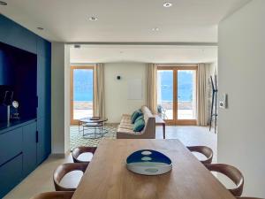 Appartements Appartement a 100metres du lac avec terrasse privee - Vue panoramique sur le lac : photos des chambres