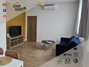 Appartements Le Carre Henaux : photos des chambres